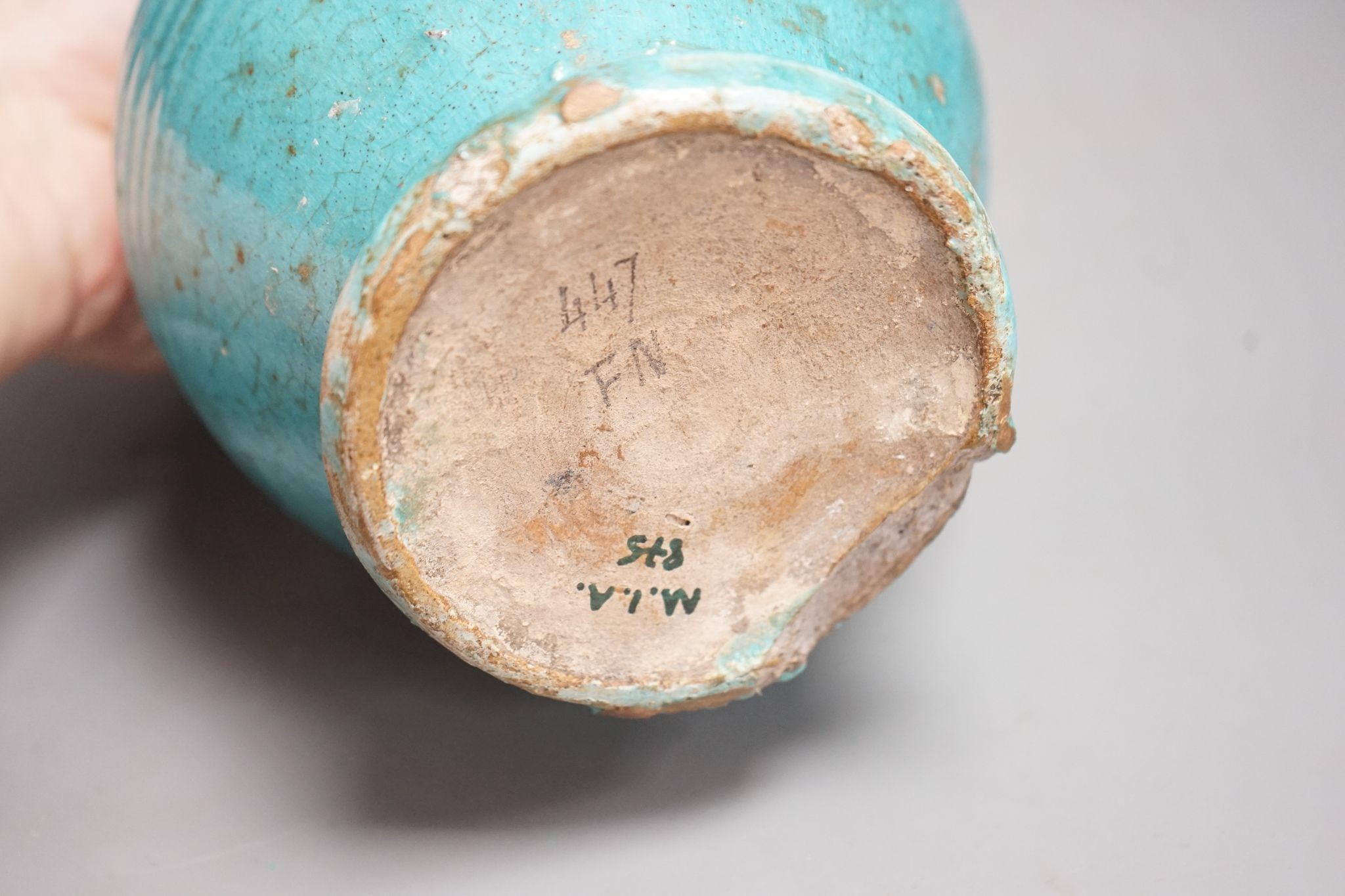 A Persian turquoise glazed huqqa base, 17th century or later, 33cm